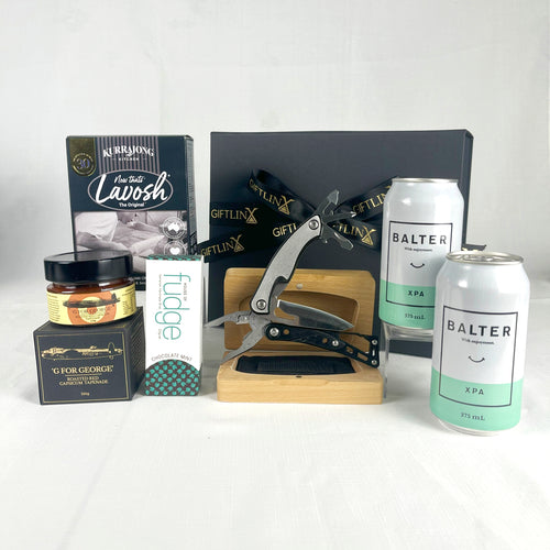 Gift set with Balter XPA cans, pliers, and other items on a white background
