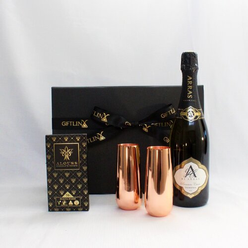 Australian Sparkling Wine, Copper champagne flutes and handmade Australian chocolate packaged in a black and gold gift box.