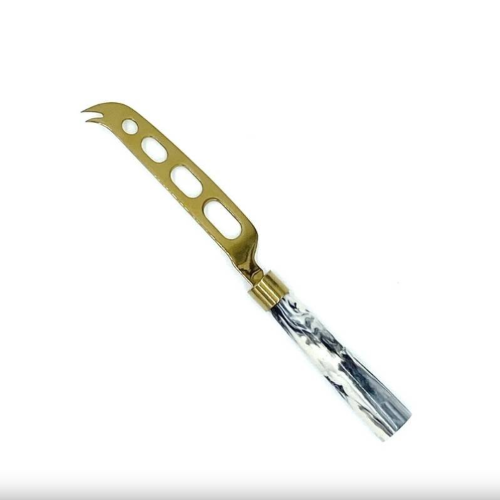 brass cheese knife with marble handle on white background