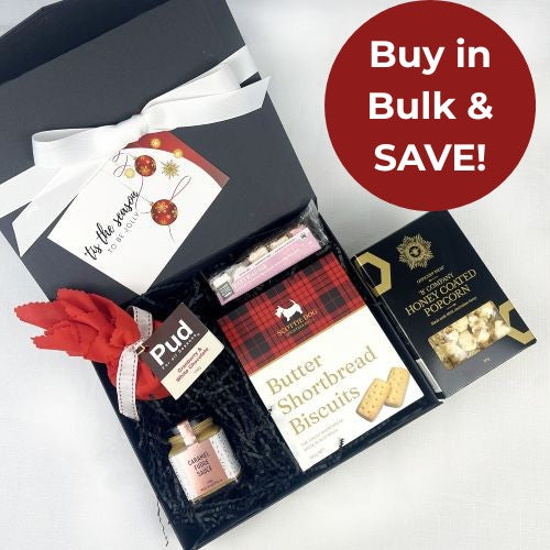 Gift box with snacks and a card, featuring a 'Buy in Bulk & Save!' label.