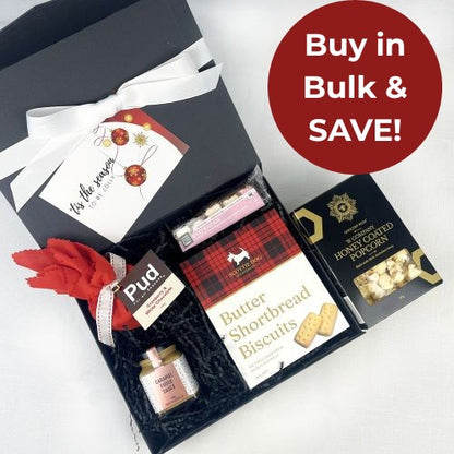 Gift box with snacks and a card, featuring a 'Buy in Bulk & Save!' label.