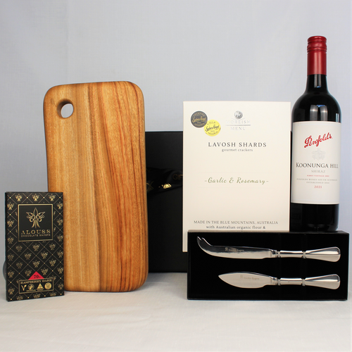 handmade timber cheese board with cheese knife set, Australian red wine, lavosh shards and handmade Australian chocolate
