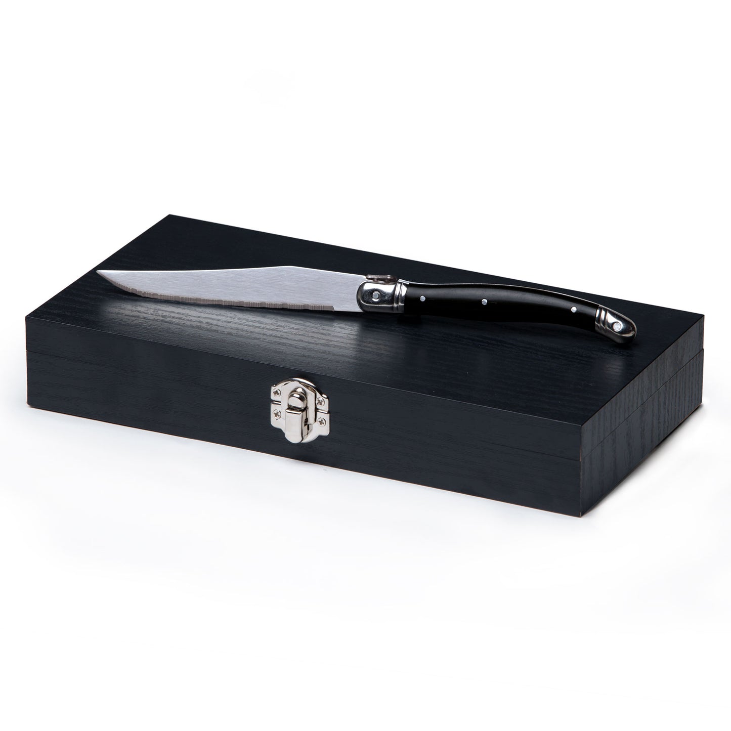 black handles steak knife sitting on top of the black bespoke box