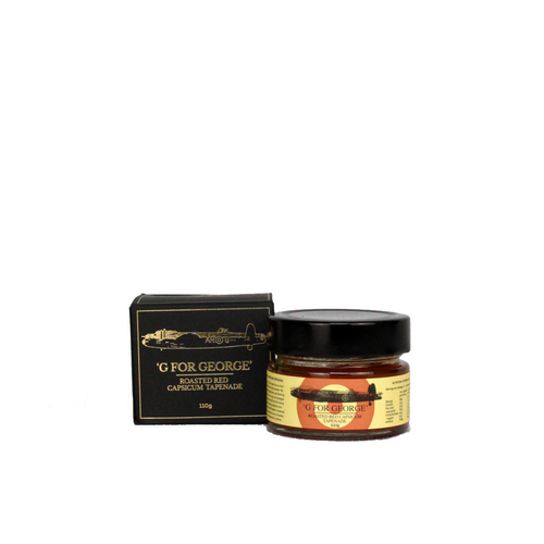 jar of capsicum tapenade next to black and gold box