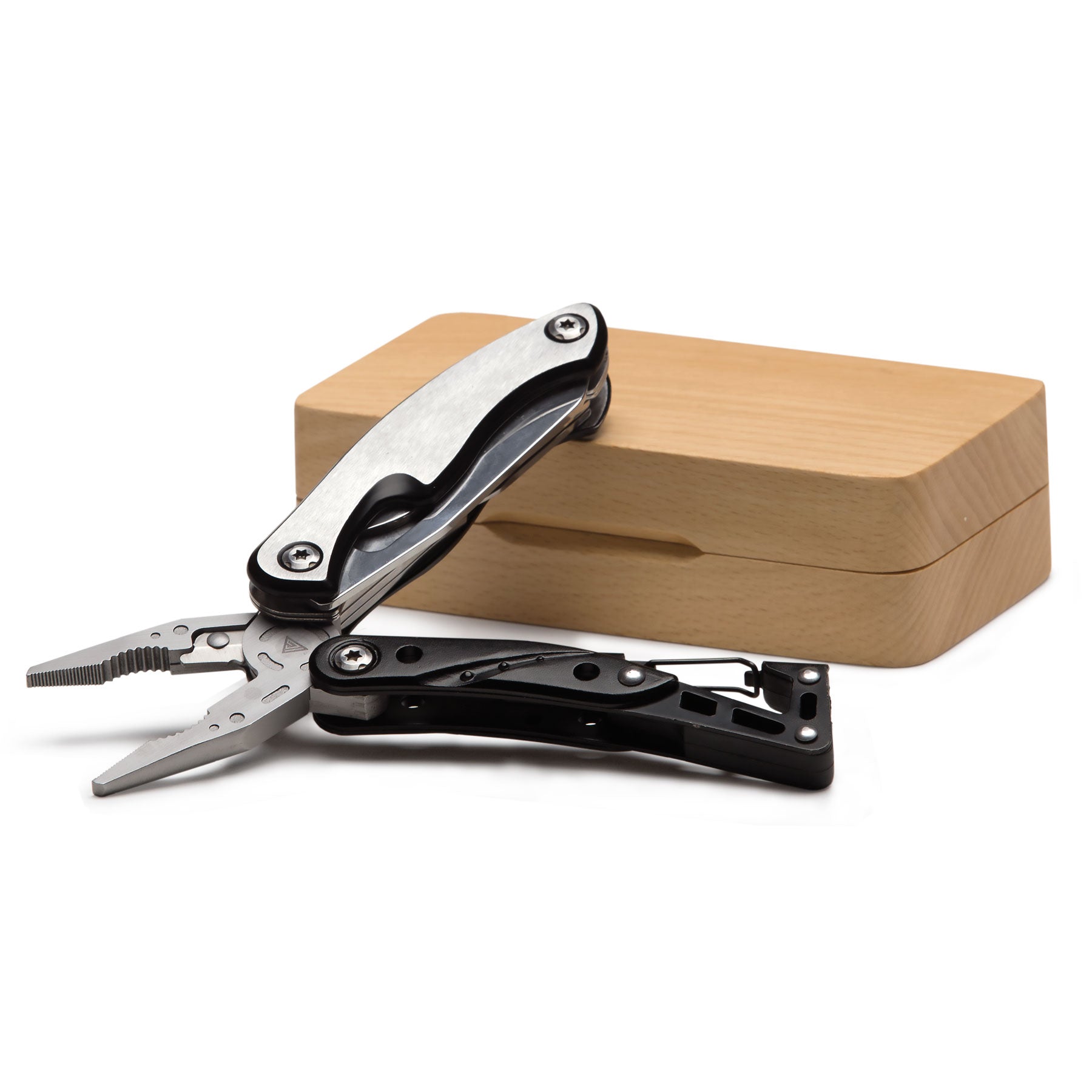 multi tool open and laying on top of a small timber box