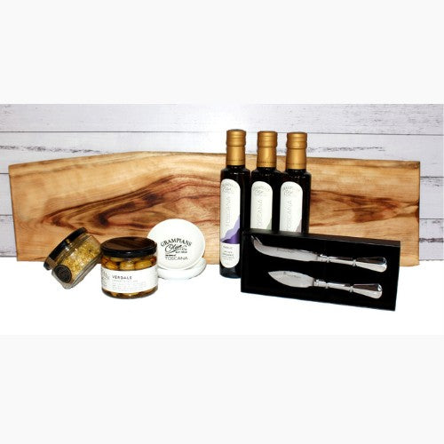 An impressive long grazing platter (handmade) with accompaniments to make a n impressive entertainers platter with oilves, dukkah infused olive oil and dipping bowls with a stainless steel cheese knife set