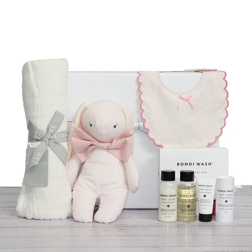 Bab ygift gift hamper with bamboo muslin wrap, baby girl bunny toy and matching baby bib plus Australian made baby bath products