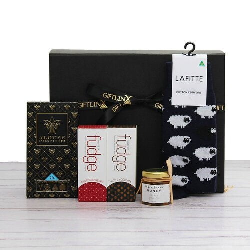 Care gift hamper with Premium Australian made chocolate and fudge (x2) with Autsralian honey and Australian made socks to keep your toes cosy!