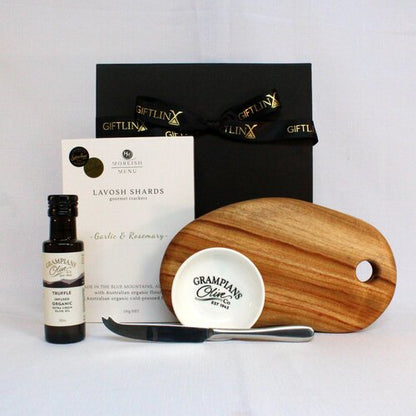 Handmade timber cheese board (small) accompanied with a single stainless steel cheese knife,  infused olive oil and dipping bowl and lavosh shards