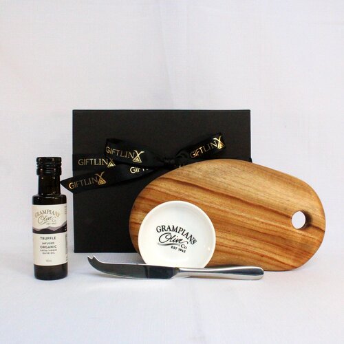 GIft hamper with small handmade cheese board, single stainless steel cheese knife, infused olive oil with dipping bowl